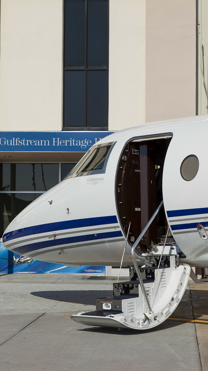Gulfstream’s huge cabin entry door, with single handrail. 