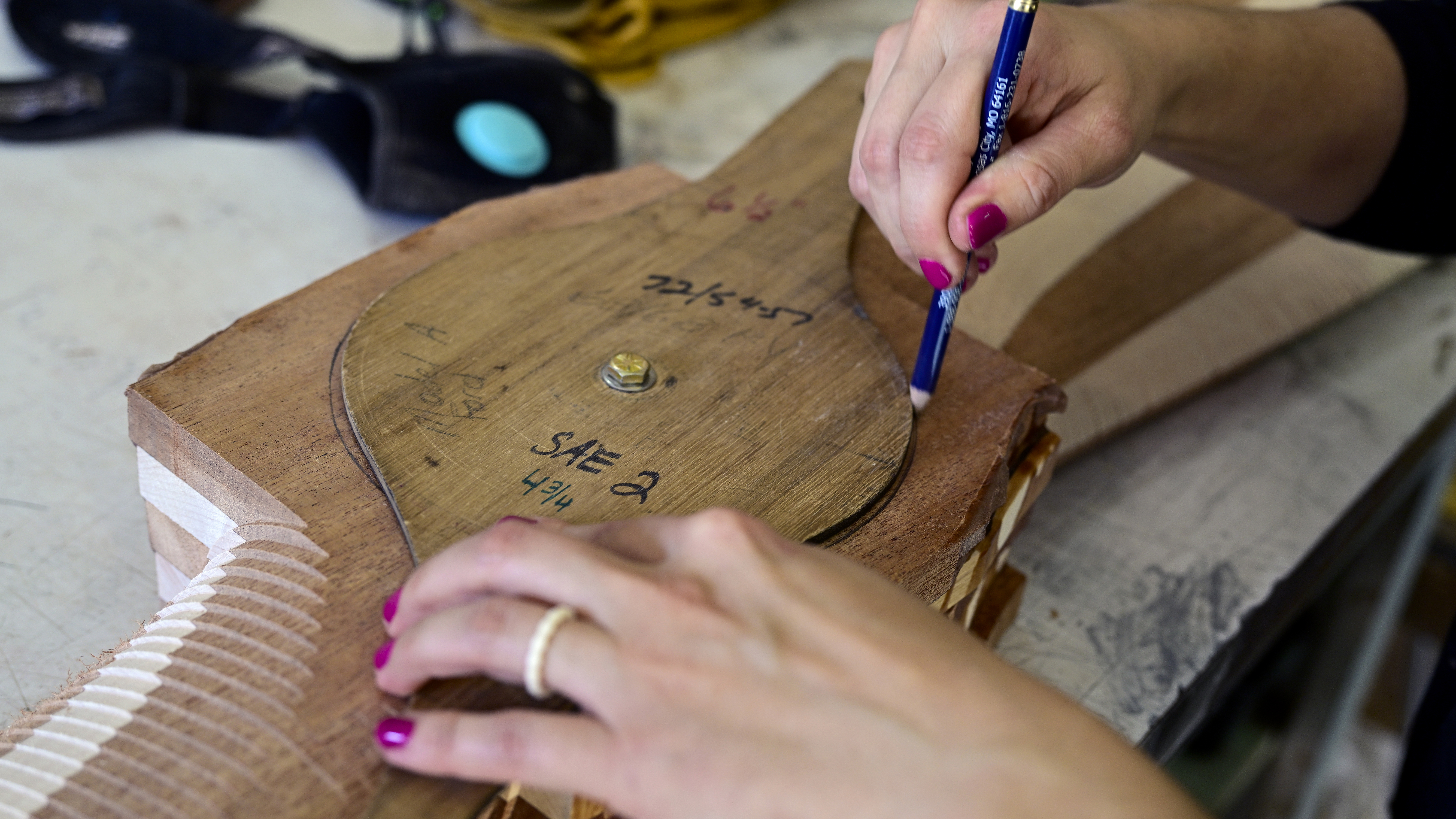 Lewis traces a template to shape the propeller hub.