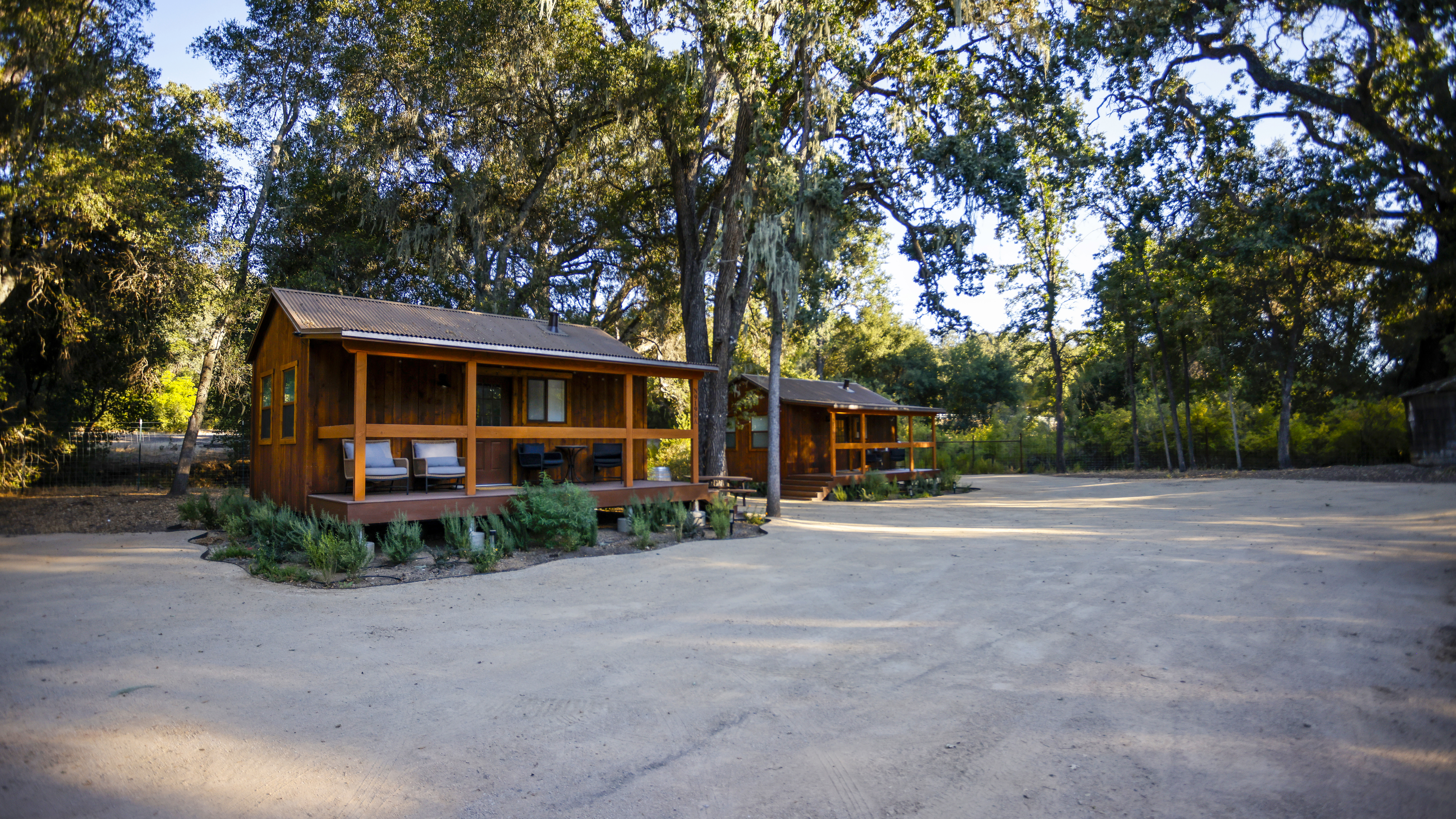 The two pilot cottages are nestled in a copse of trees south of the runway.
