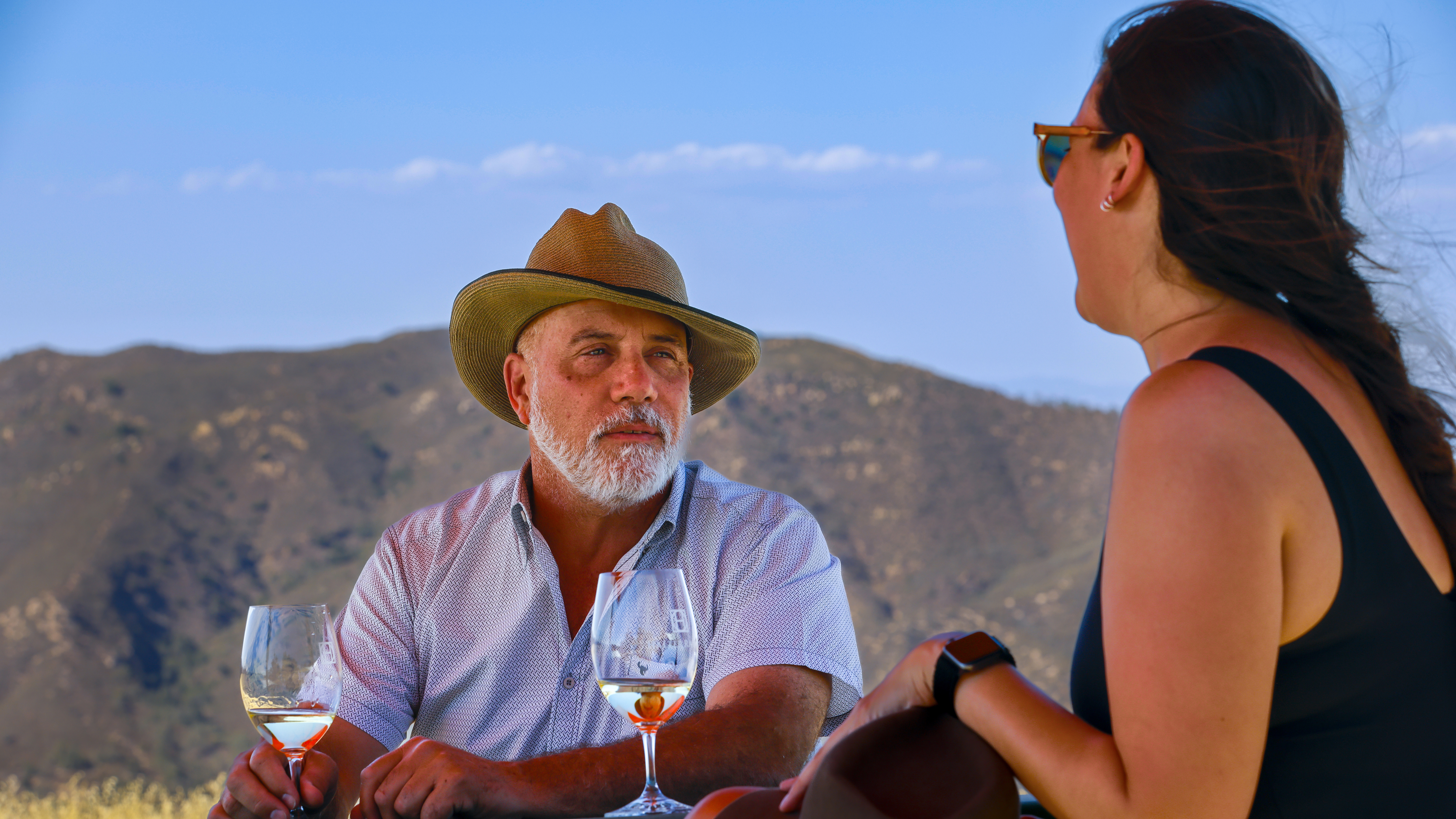 Timothy Argie describes the history of Halter Ranch and its wine at a shaded picnic table.