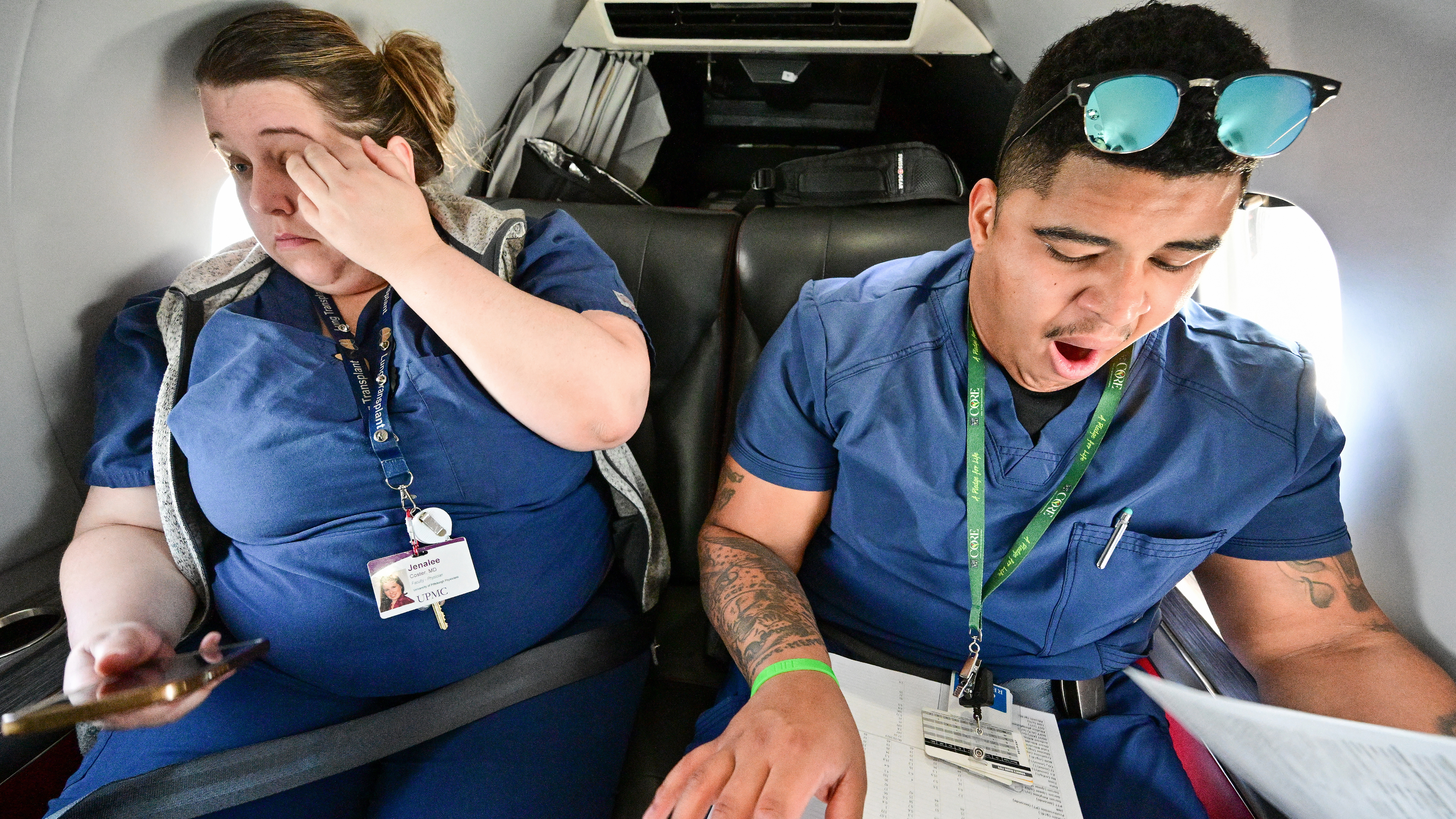 Jenalee Coster (left), a surgeon, and Elijah Gray (right), a transplant coordinator, work closely together for grueling hours on complex and time-sensitive transplant cases.