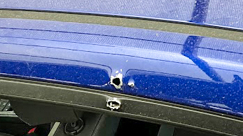 Yuriy Yakovlyev returned to find bullet holes in his car.