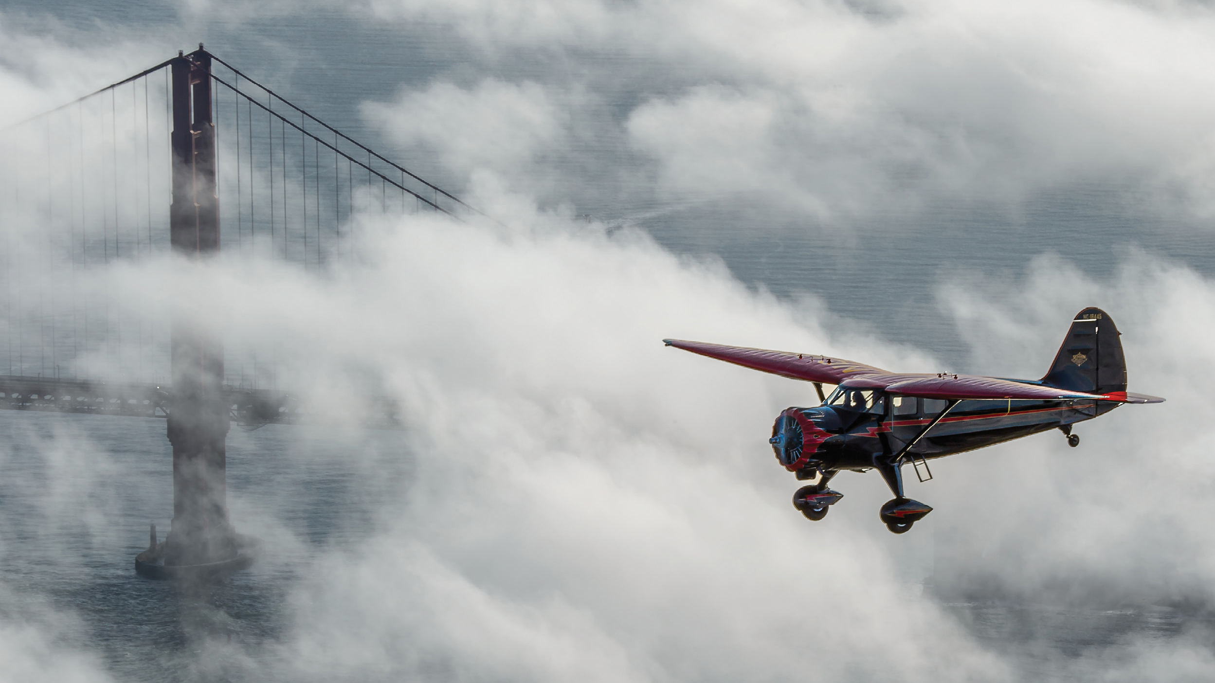 Stinson SR-9F Reliant over the Golden Gate Bridge. "A photo mission I will always treasure. The Stinson SR-9F piloted here by its owner Scott Woods with the Golden Gate in the background, two classics from the grand era of travel and adventure.”