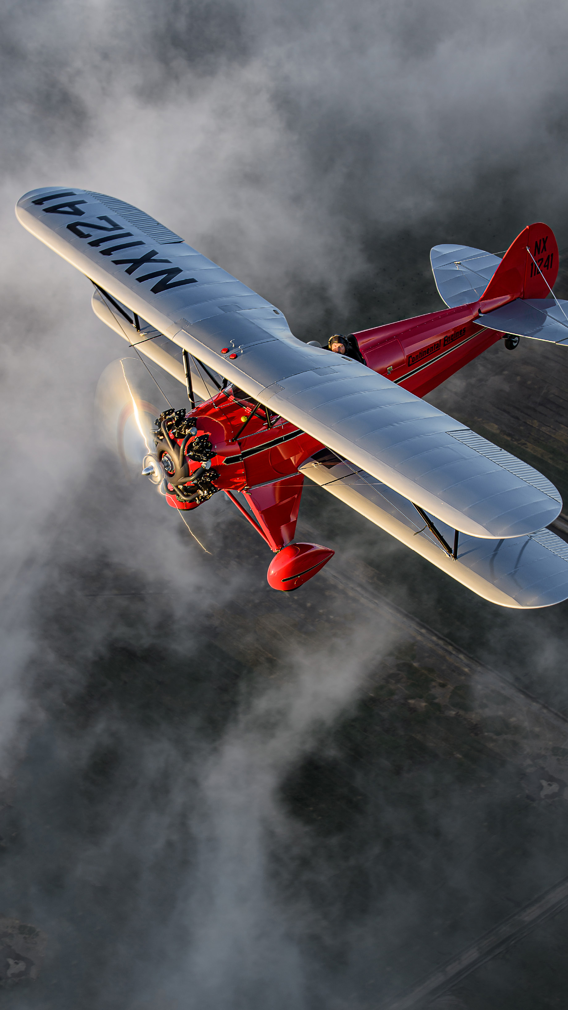 Betsy, a Waco QFC-2, flown by Bernie Vasquez. "The Waco QFC-2 quickly established itself as the biplane of the day, earning a grand reputation for its class and became affectionately known as simply the F-2.”