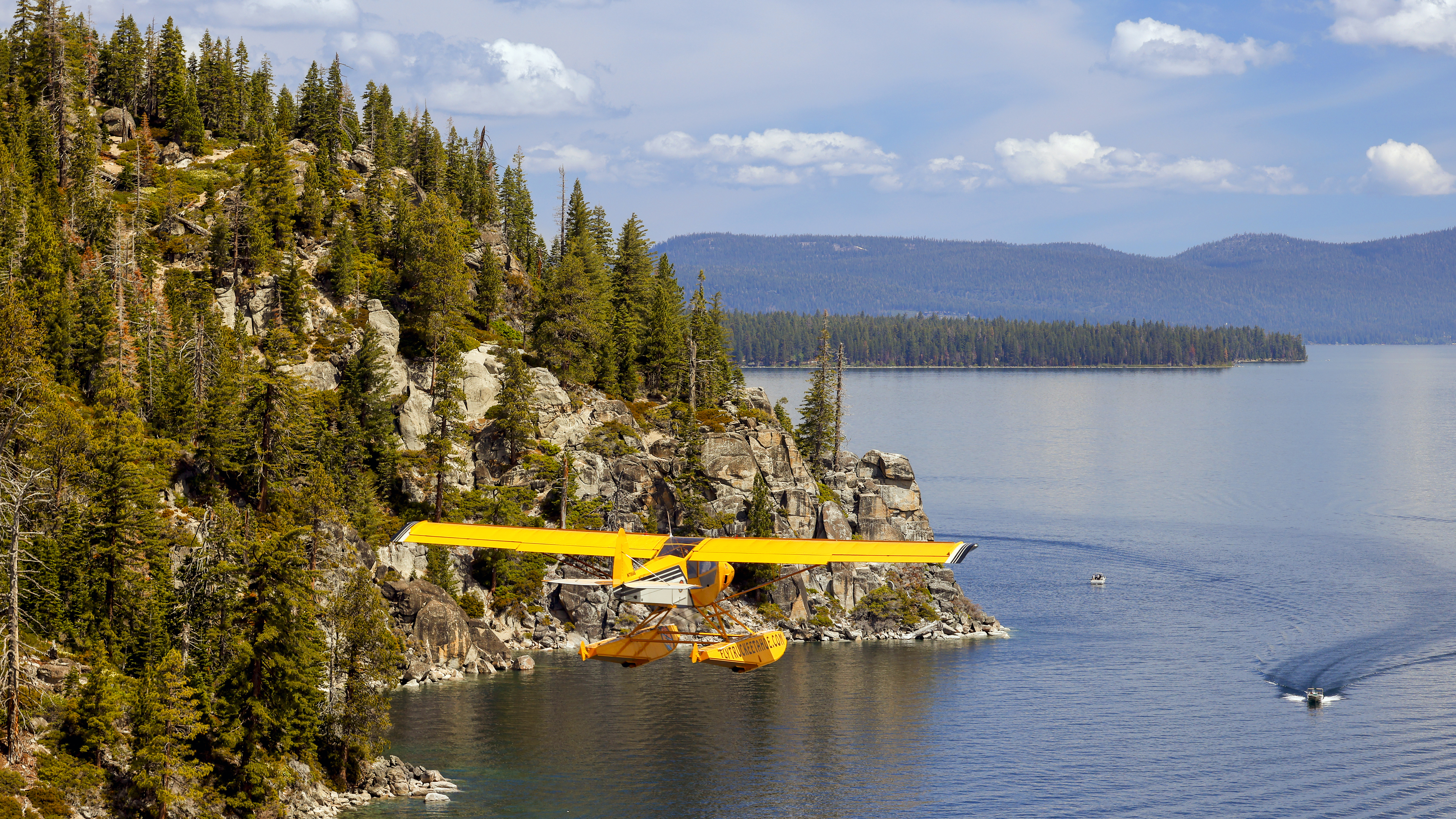 The view of the shoreline changes from sand to rocks often.