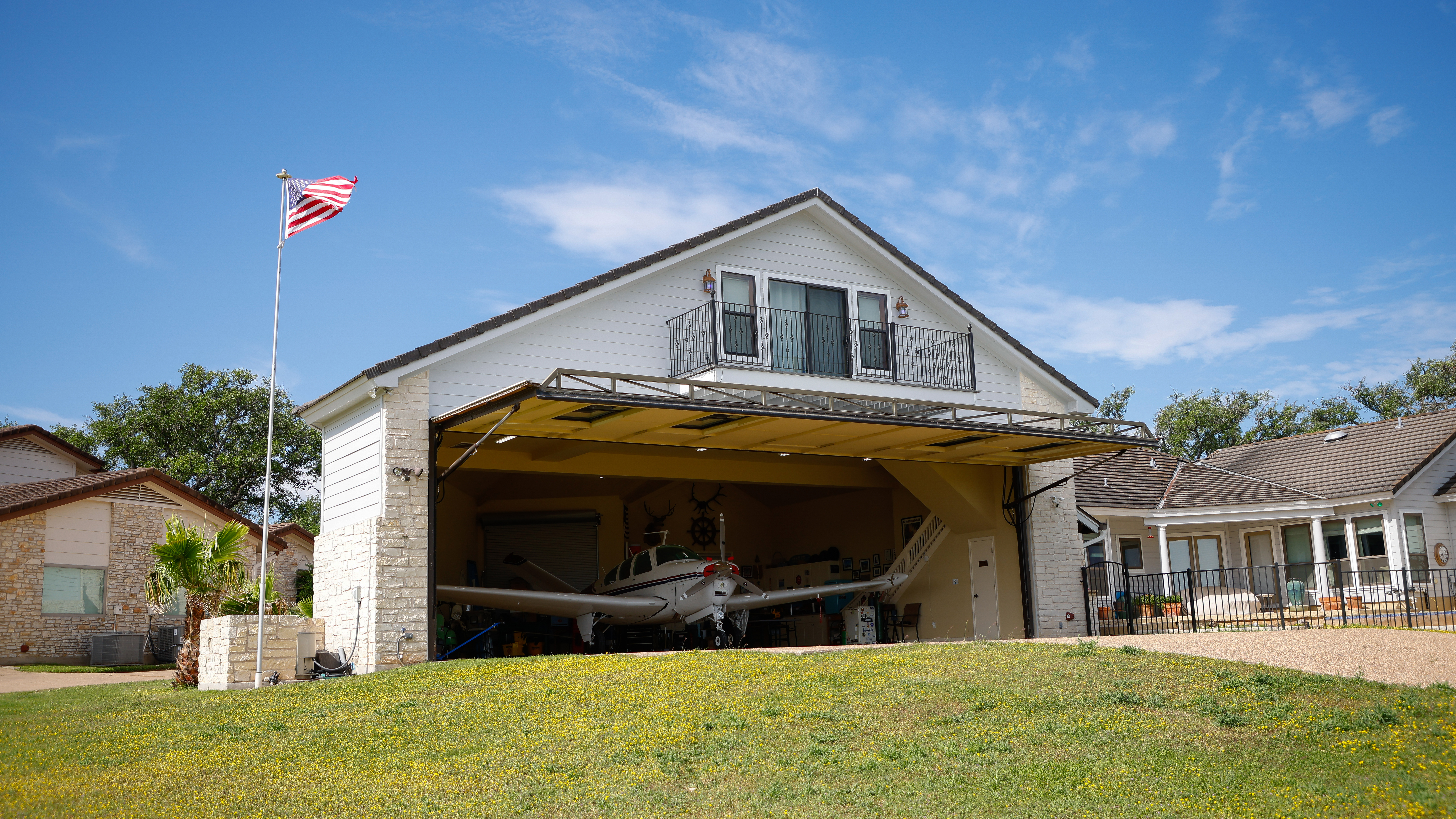 HOA President Phillip Thompson keeps his 1977 V-tail Bonanza in his hangar overlooking the Lakeway Airpark runway and his office is located over his hangar.