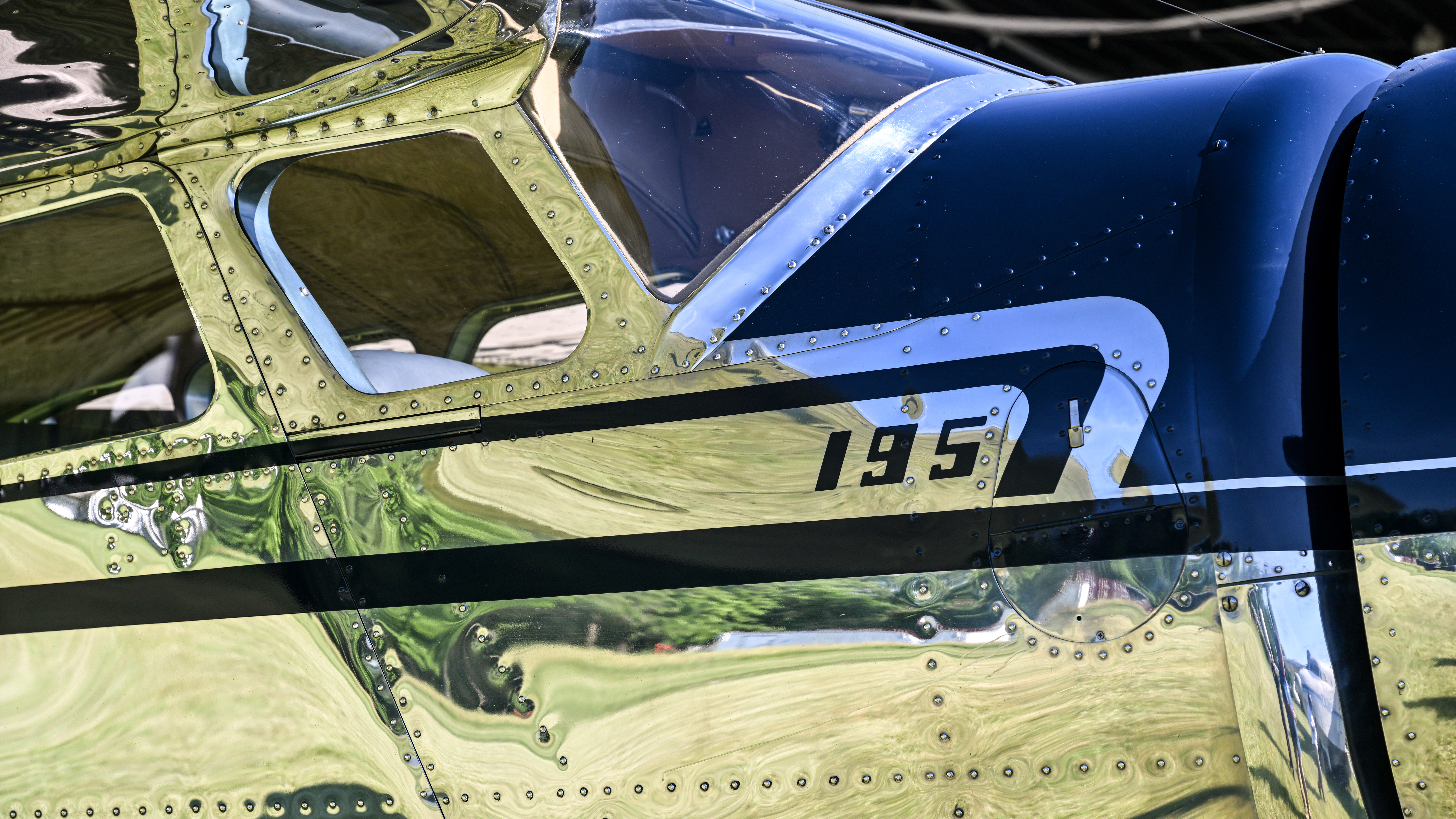 The oil filler door is neatly concealed in front of the 195 script.