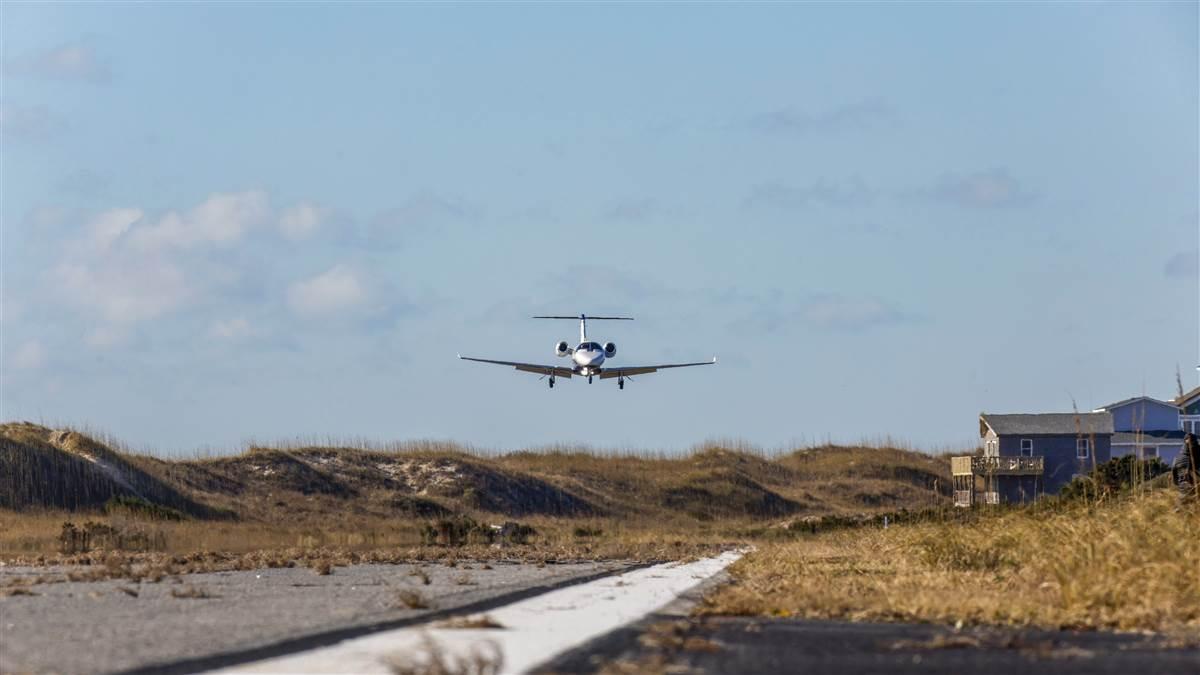 Even when landing at a VMC-only airport with minimal infrastructure, proper use of the aircraft's avionics platform can provide lateral and vertical guidance to the landing runway, aiding in the execution of a stabilized visual approach. Photography by David Tulis.