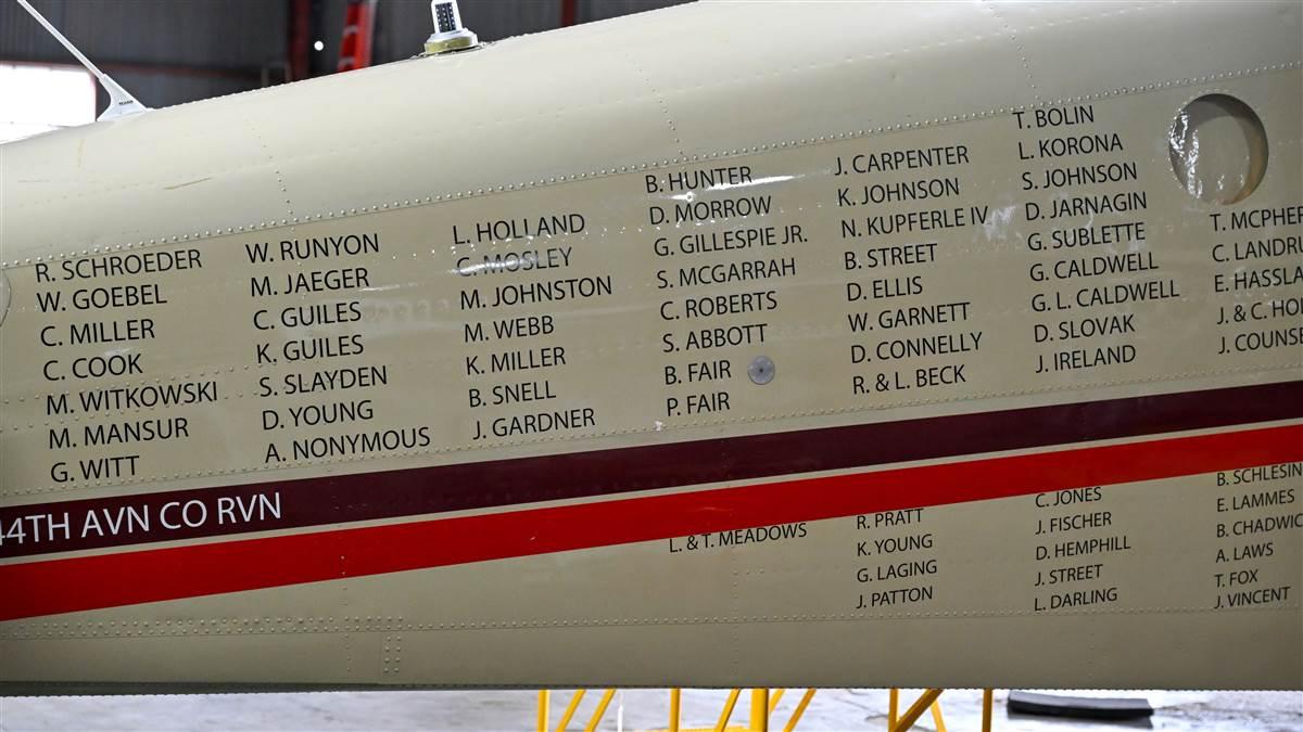 Names of individuals who have supported the restoration are stenciled on the side of the Twin Beeck, which is hangared in the Vintage Flying Museum in Fort Worth, Texas.