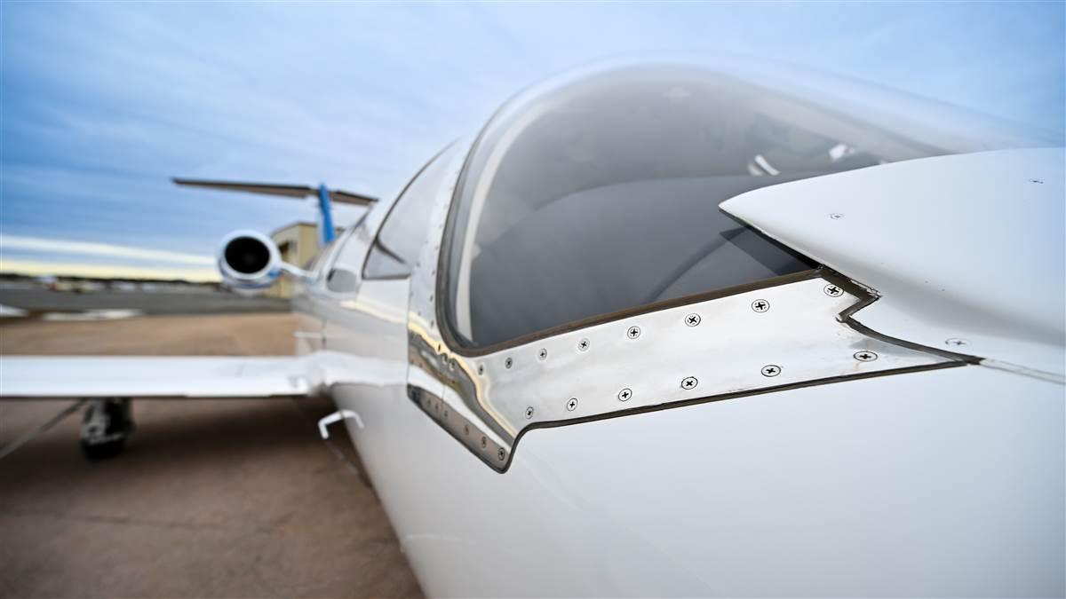 Bleed air heats the windshield for anti-icing—noisy but effective.