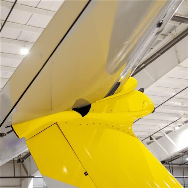 The oversized stabilator on the T-tail must have enough pitch authority to counter powerful nose-down forces from wing flaps that extend to 60 degrees on approach to landing.