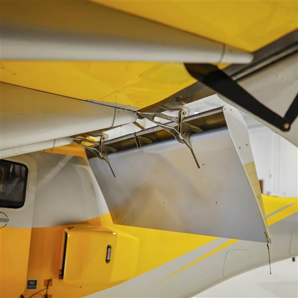 Oversized, slotted flaps and drooped ailerons redirect accelerated air downward creating even more lift.