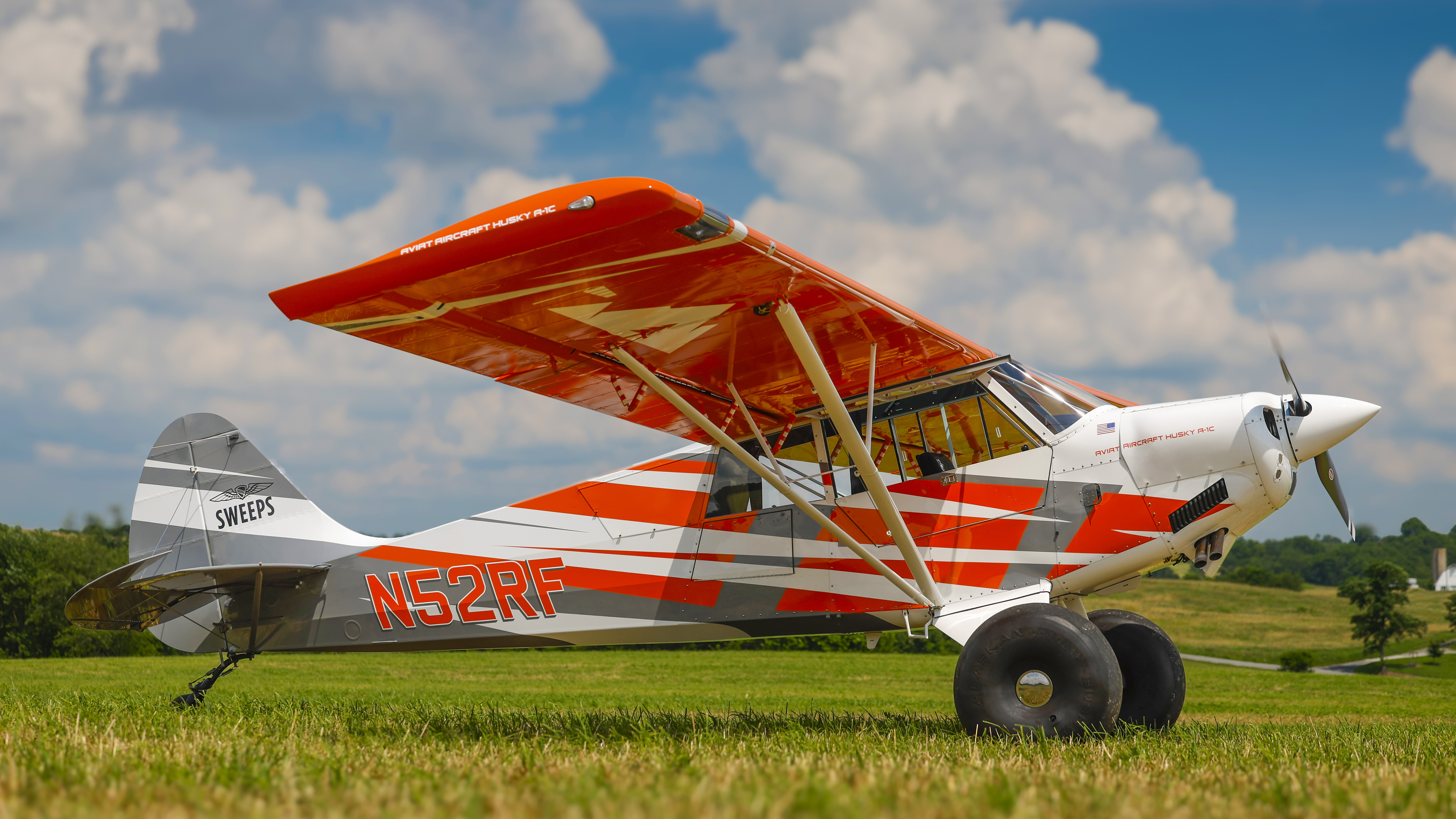 The AOPA Sweepstakes Aviat Husky rests in a Virginia hayfield.