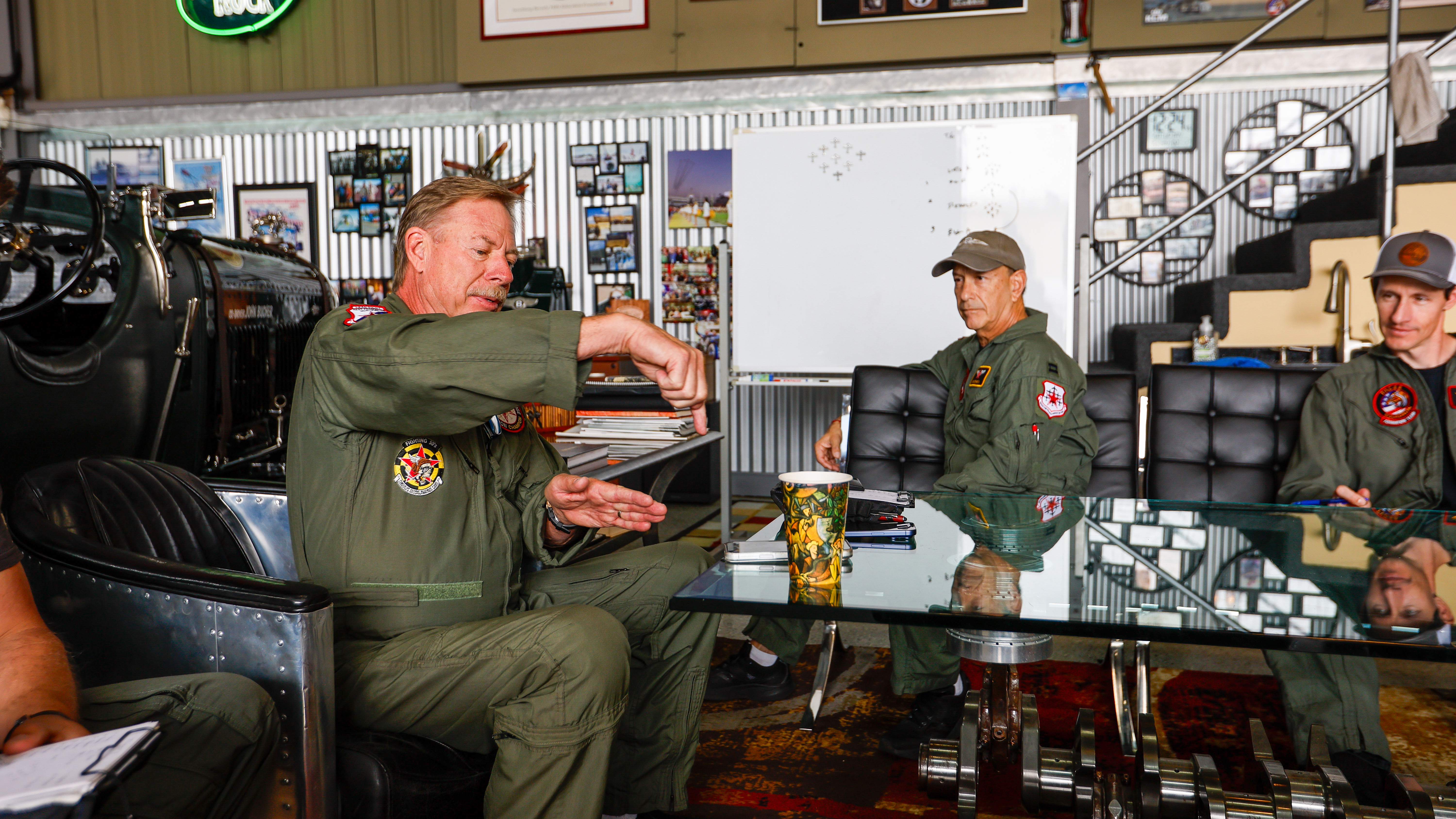 Ekberg briefs the flight while pilot David Shaby listens attentively.