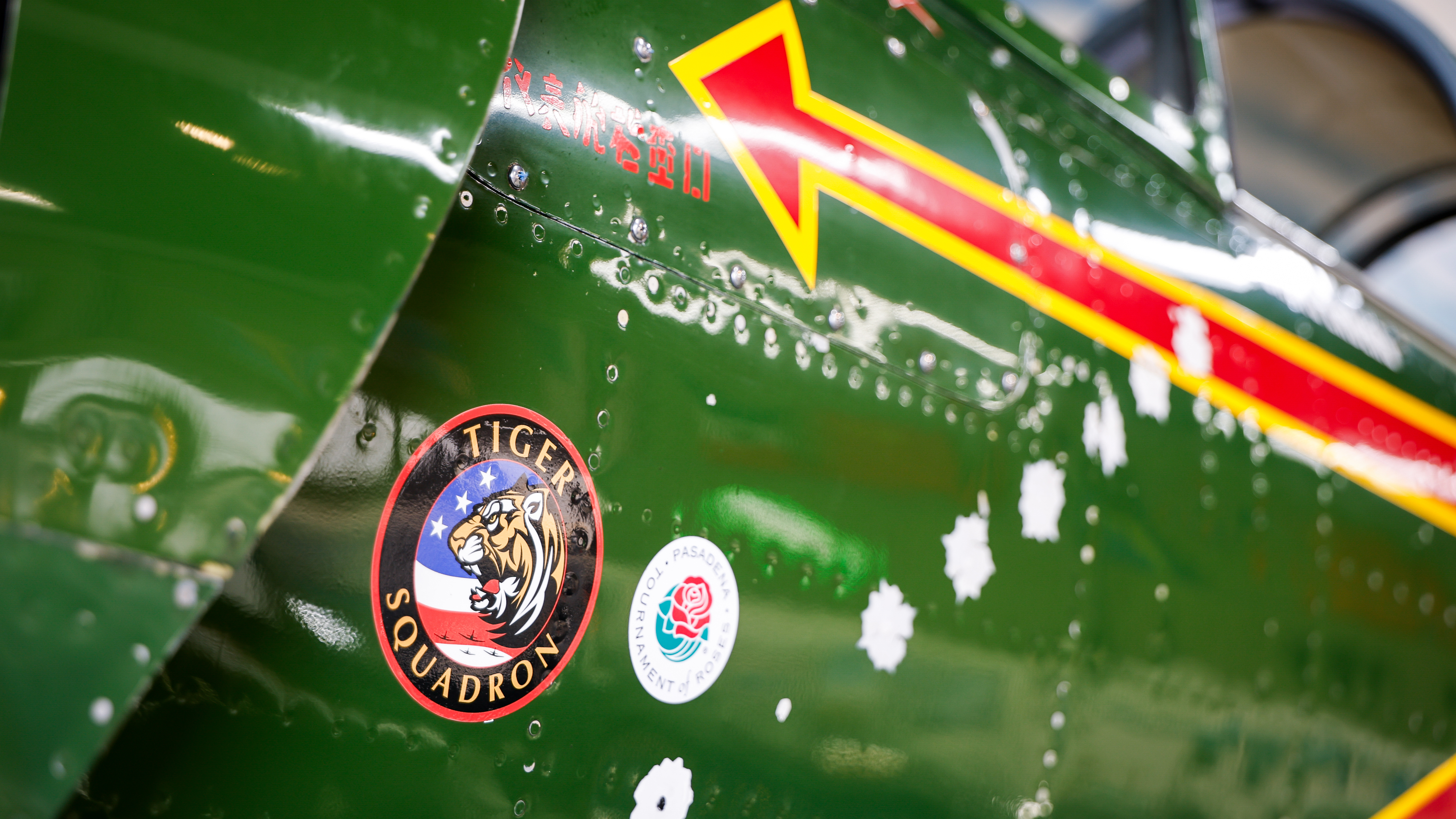 The Rose Parade seal is proudly painted beside the Tiger Squadron logo on Ekberg’s Nanchang.