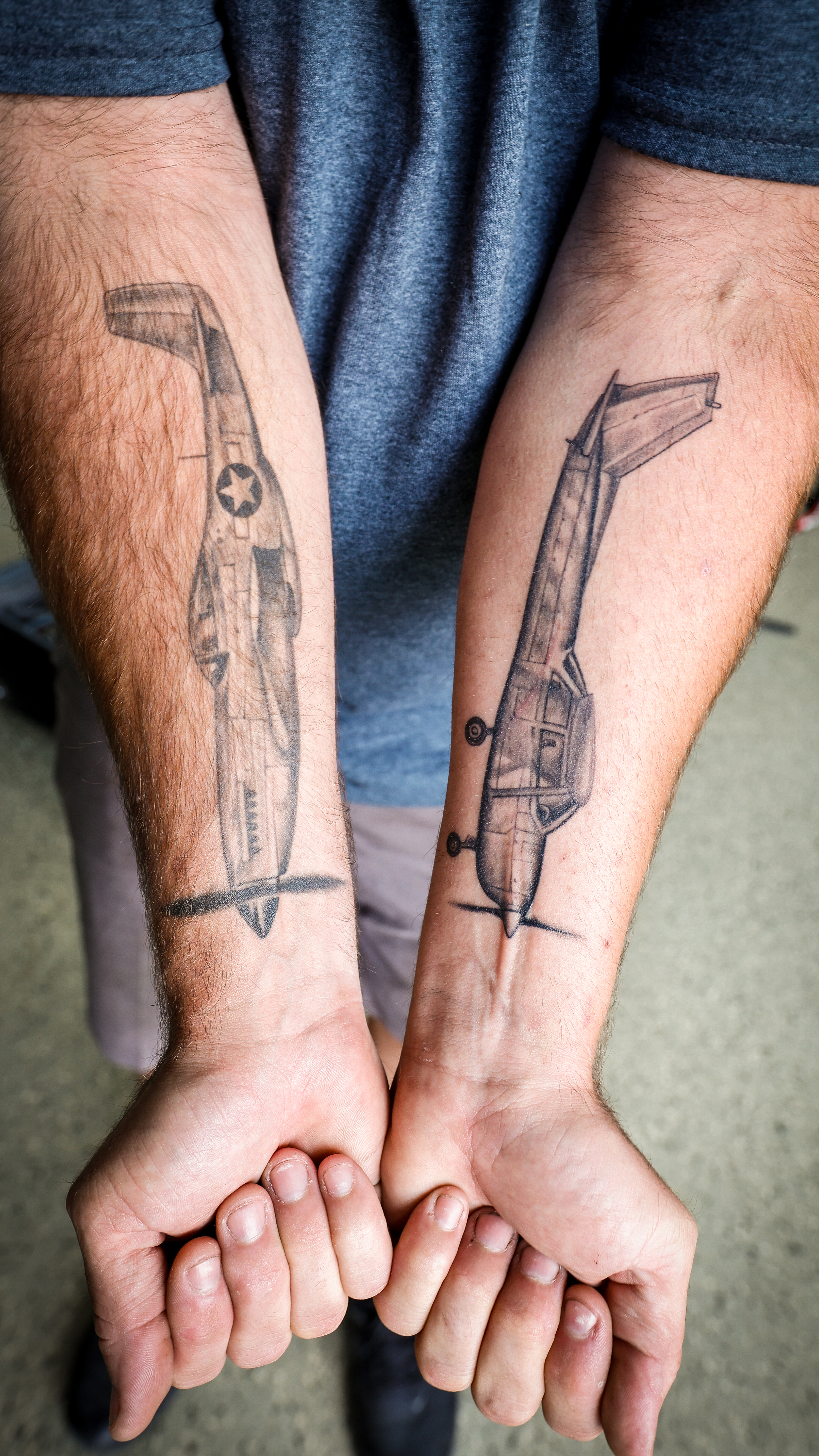 Mechanic Scott Brown’s love of aviation is inked on both arms.