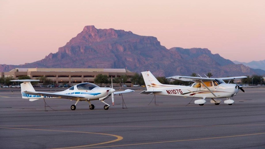 aircraft on a runway in utah during sunset