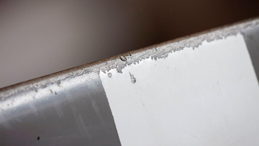 close up on the weathering on an aircraft propeller blade