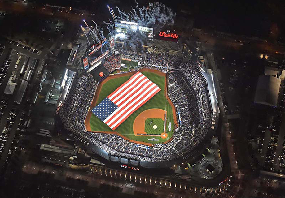 Fireworks explode during the National Anthem at the New York Mets vs. Kansas City Royals World Series Game 3 at Citifield in this image made from the photographer's Cessna 150 photo platform. Photo by Kevin Coughlin.