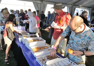Pilots line up for doughnuts and coffee. Mike Collins photo.