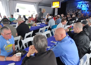 Air Safety Institute Senior Vice President George Perry, third from left, talks with donors at Sun 'n Fun.
