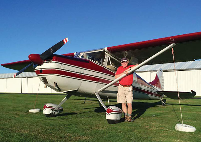 William Buchanan poses with his Cessna 170A after flying it from Arizona to his home airport, Harvey Field, in Snohomish, Washington. Photo by Jon Counsell.