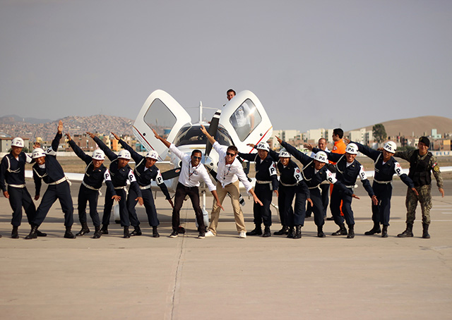 Fly for MS pilots join Peruvian security officials during a stopover during their circumnavigation flight of South and Central America for multiple sclerosis awareness. Photo courtesy of FlyforMS.org.