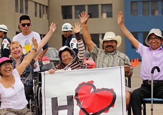 Multiple sclerosis patients have a warm welcome in Peru for the Fly for MS team. Photo courtesy of FlyforMS.org.