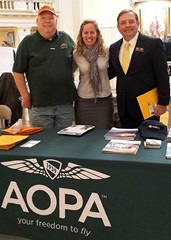 Airport Support Network Volunteer Don Heegel and the Oklahoma Aeronautics Commission's David Conway join AOPA's Yasmina Platt during Aviation and Aerospace Day at the state capitol Feb. 10. Photo by Yasmina Platt.