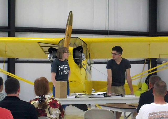 Purdue University aviation students Paul McGuire and Macy Cupp teach a ground school class to dozens gathered in a hangar at Indiana’s Marion Municipal Airport. Photos courtesy of Macy Cupp.