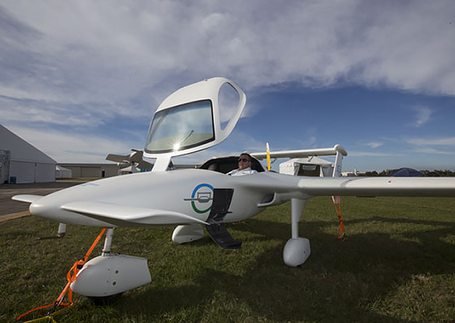 Commuter Craft test pilot Ethen Chaffin sits in the wide cockpit of the Innovator designed by Richard Hogan. The roadable two-seater design features a pusher prop, a canard, and four lifting surfaces. Photos by Jim Moore.