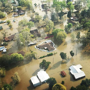 Flooded homes in Orange, Texas. Photo courtesy of David Lewis and Anthony Goss.
