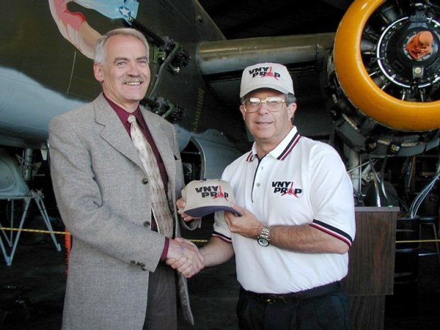 VNYPROP President Elliot Sanders (right) presents AOPA Regional Affairs VP Bill Dunn with one of the group's baseball caps.