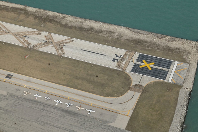 City of Chicago suddenly tears up the Meigs Field runway.