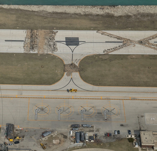 City of Chicago suddenly tears up the Meigs Field runway.