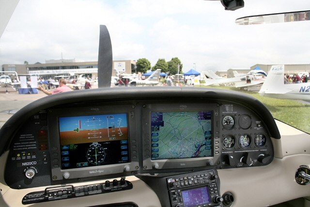 AOPA Fly-In static display ramp through the windshield of a Cirrus SR-22