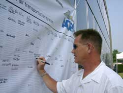 Michael Schaal of Severn, Maryland, adds his signature to AOPA's petition against user fees.