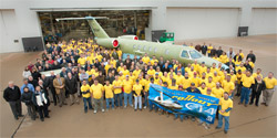 The manufacturing crew of Cessna stopped to pose with the rollout jet
