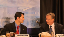 David Coleal of Bombardier Learjet and Jack Pelton of Cessna talk before the Wichita Aero Club luncheon.