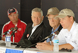 Rep. Sam Graves (R-Mo.), right, answers a question.