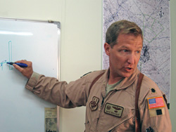 Lt. Col. Nate Brauner presents a ground school lesson