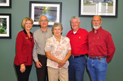 Left to right: AOPA Executive Vice President of Communications Karen Gebhart; Richard Cornelius; Bo Cornelius, Richard's wife; NASCAR driver Bobby Allison; Jim O'Daniel. O'Daniel was Cornelius' flight instructor.