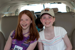 Two girl scouts tour AOPA's Cessna Caravan.
