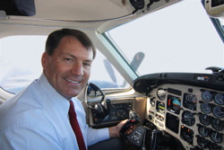 South Dakota Gov. Mike Rounds said flying for his duties as governor gives him a refreshing break from day-to-day activities: a chance to put everything else out of his mind and focus on flying. Photo courtesy of South Dakota Tourism
