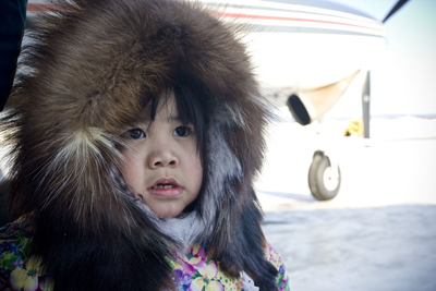 This toddler has just arrived in Fairbanks from the native village of Anaktuvuk, and now faces a five-hour drive to Anchorage to watch her sister play in the state basketball championship tourney.