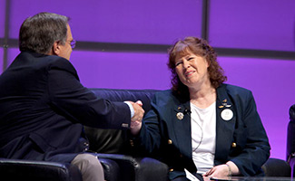 AOPA President Craig Fuller presents the 2010 Laurence P. Sharples Perpetual Award to Marjy Leggett for her efforts to promorte and protect Vista Field in Kennewick, Wash.
