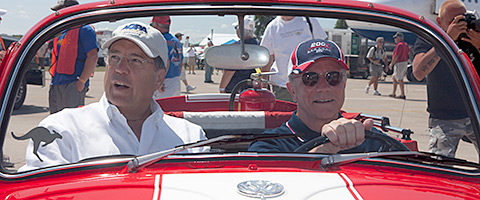 AOPA President Craig Fuller and EAA Chairman Tom Poberezny enjoyed a ride through the AirVenture grounds.