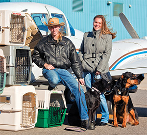 Ted DuPuis and Cloud Nine Chief Operating Officer Laurie Puckett, with Duchess and Duke