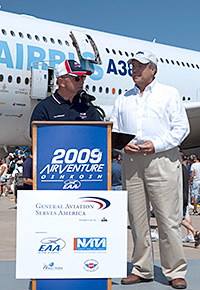 EAA Chairman Tom Poberezny and AOPA President Craig Fuller formalized collaborative efforts at AirVenture 2009.