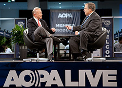 EAA Chairman Tom Poberezny enjoys a lively discussioin with AOPA President Craig Fuller on AOPA Live at AOPA Summit 2009.